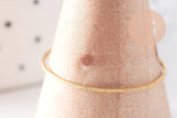 Bague très fine alliance acier inoxydable doré sablée 1mm, x1 (G10366)