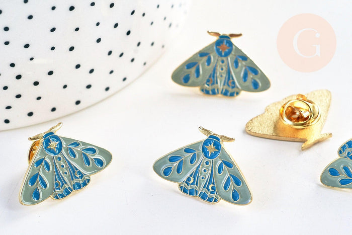 Broche pins papillon mystique doré émail bleu 27.5x18mm, x1 (G5547)
