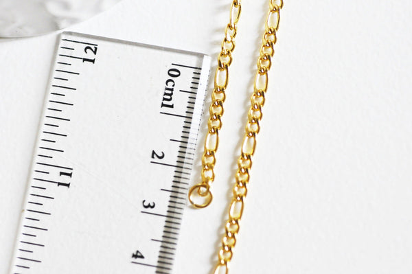 Chaine avec fermoir acier doré 18k figaro 3mm-45cm, x1 (G1491)