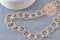 Chaine doré maille ronde texturée aluminium doré pâle 24mm, x1 mètre (G2783)