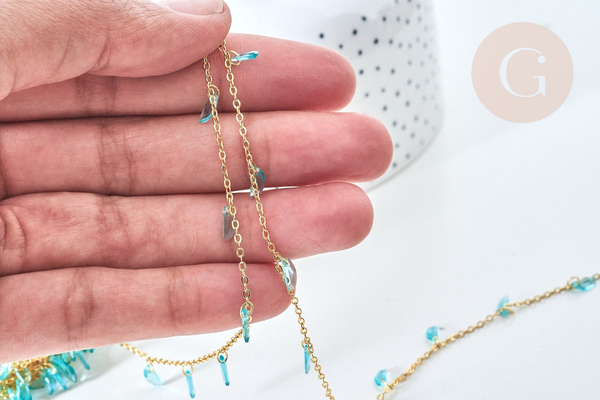 Chaine perle plexiglas facettée turquoise laiton doré 7x3mm, création de bijoux coloré DIY, x1 mètre (G7820)
