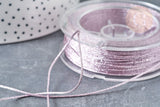 Cordon lilas clair métalisé tressé polyester 1mm, x1 mètre (G8174)