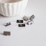 EP Embouts ruban métal metalgun à pincer,fournitures noires,création bijoux,finition ruban,finition chaine,x 10,1cm G286