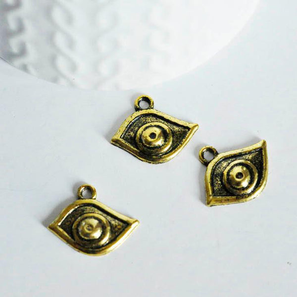 EP Pendentif oeil vieil or,pendentif doré, porte-bonheur,mauvais oeil,argent tibétain doré,création bijoux,x 10,4.5cm-G718