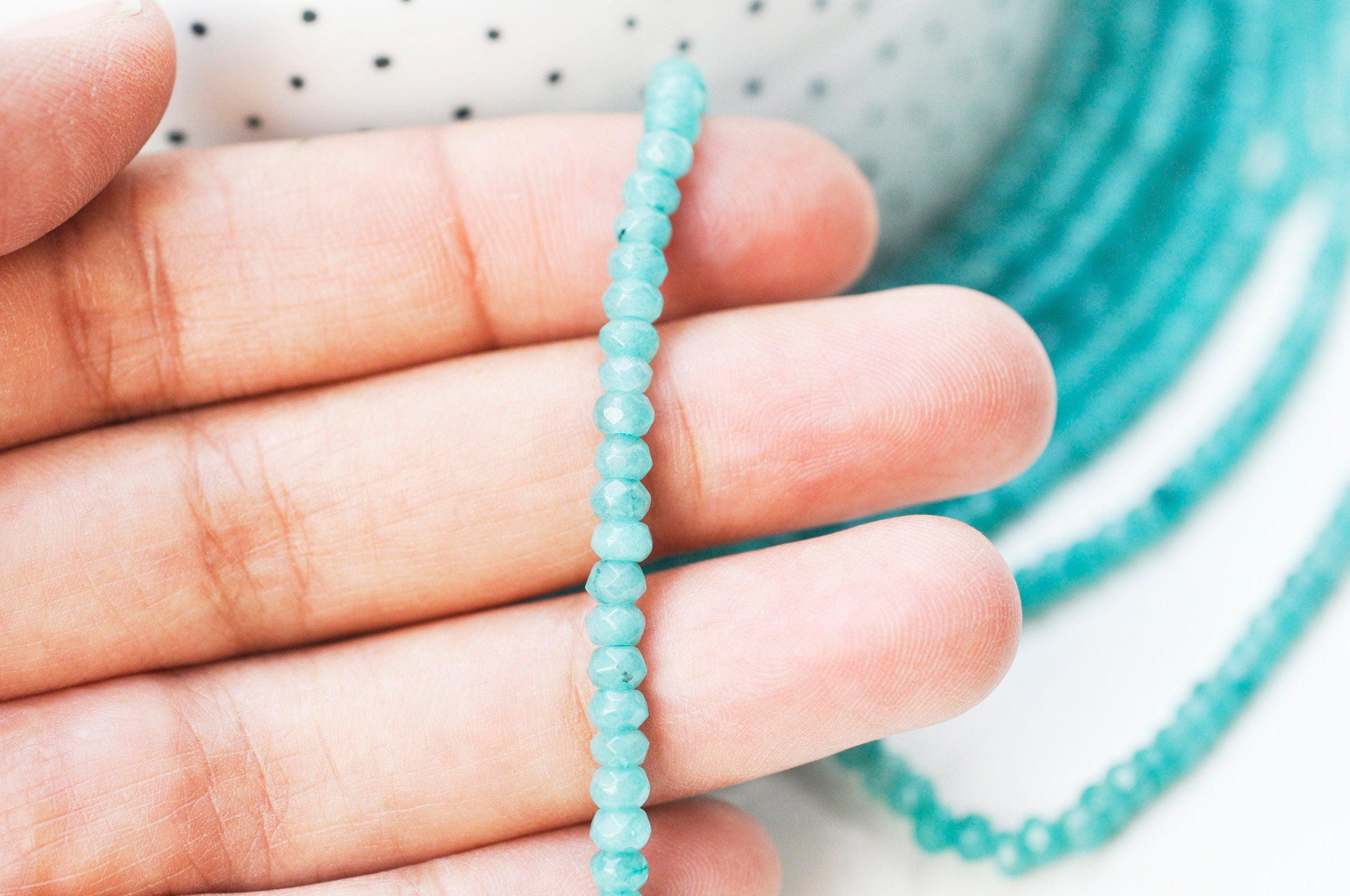 EP Perle abacus jade teinté bleu turquoise 4x2mm,fil de 38,35 cm G4710