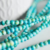 EP Perle jade océan naturel bleue 4mm, x1 fil (G1644)