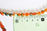 EP Perle jade orange facettes 8mm, x1 fil 45 perles (G3043)