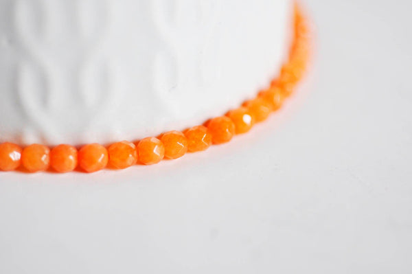 EP Perle jade orange naturelle facette 4mm, x1 fil de 90 perles G0270
