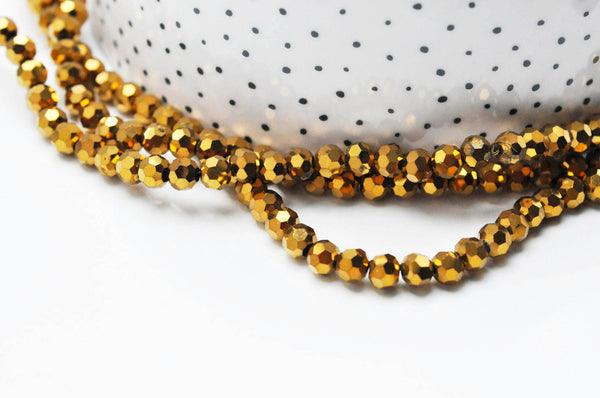 EP Perle ronde facetté hématite dorée, x1 fil de 50cm G4760