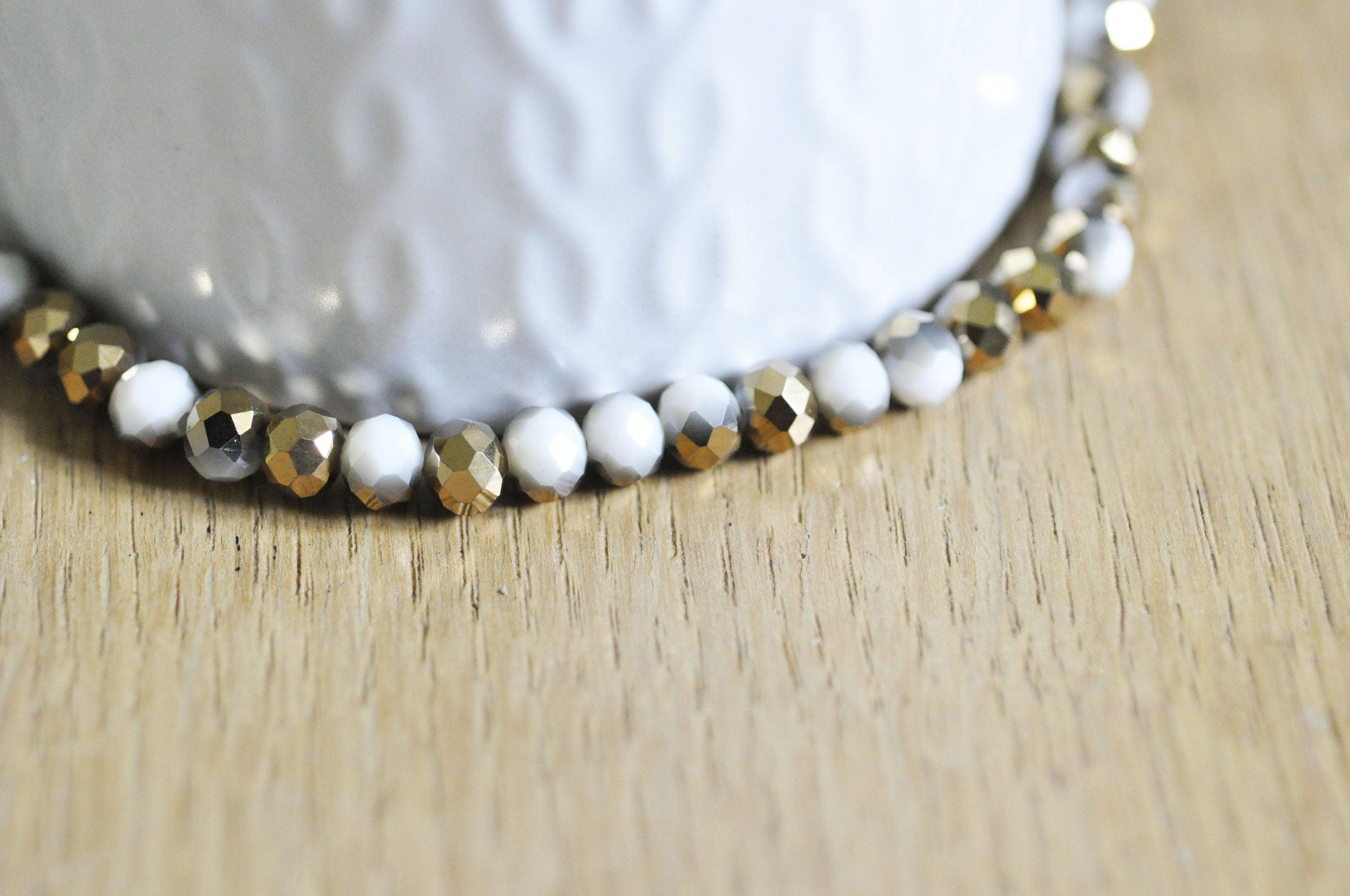 EP-Perles toupies cristal blanc doré 6x5mm x1 fil de 90, G4693