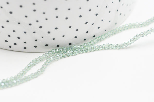 EP-Perles toupies cristal vert irisé facette 2.5mm, fil de 40cm G4435