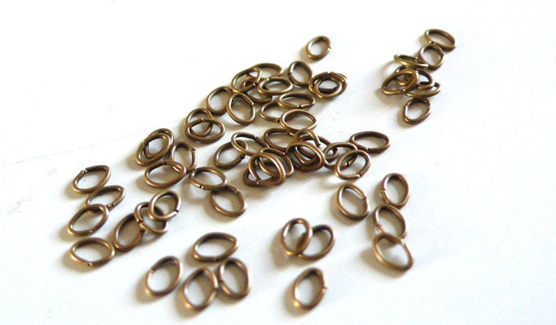 EP anneaux fins ovales bronze 4mm, x1 gramme (G2327)