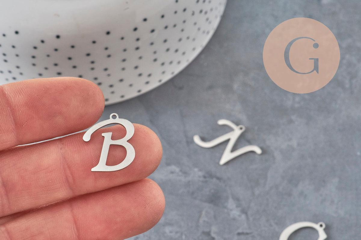 Pendentif lettre initiale acier inoxydable platine 20.5mm, x1 (G11374)