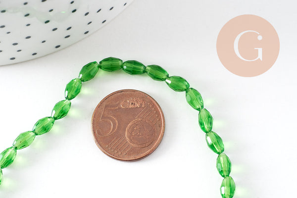 Perle ovale verre facetté vert clair 6x4mm, fil de 38cm, x1 (G10600)