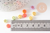 Perle ronde Symboles plastique multicolore pastel doré, x10 grammes (G10557)