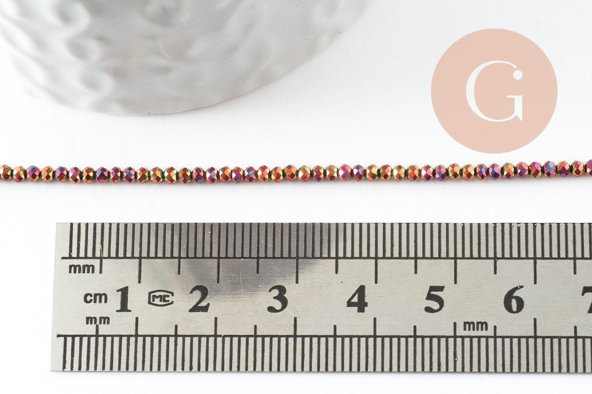 Perle ronde verre facettée multicolore pourpre irisée 2mm, x1 fil de 35cm (G7456)