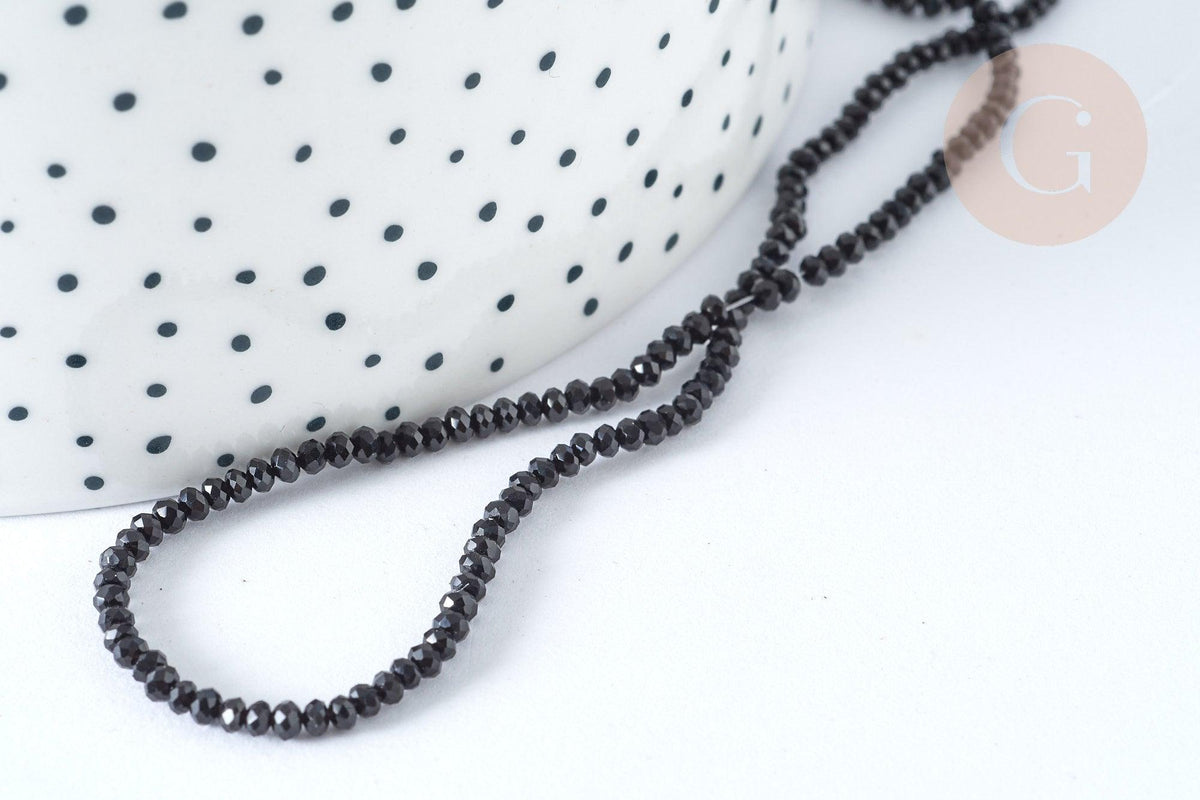 Perle ronde verre facettée noire 2mm, x 1 fil de 26cm (G7398)
