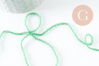 Perle ronde verre facettée transparente vert clair 2mm, DIY, fil de 37cm, x1 (G7445)