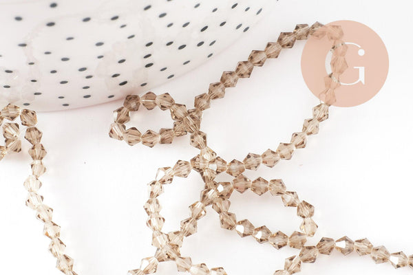 Perles cristal toupies facette beige transparent 3mm,fil de 36cm, x1 (G2598)