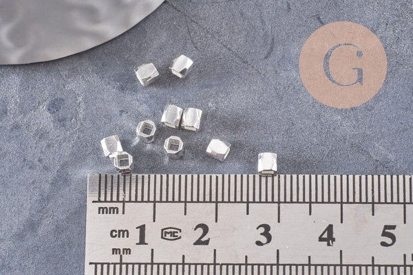 Perles intercalaires facettées laiton argenté ou doré, 3x3mm, x50 (G9906)