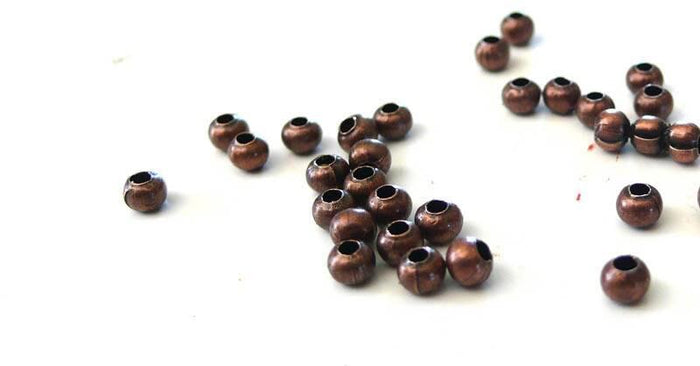 Perles intercalaires fer cuivre 3mm, x10 gr (G1264)