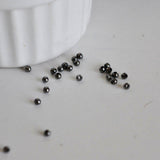 Perles intercalaires noires métalgun 3mm, x10 grammes (G2441)