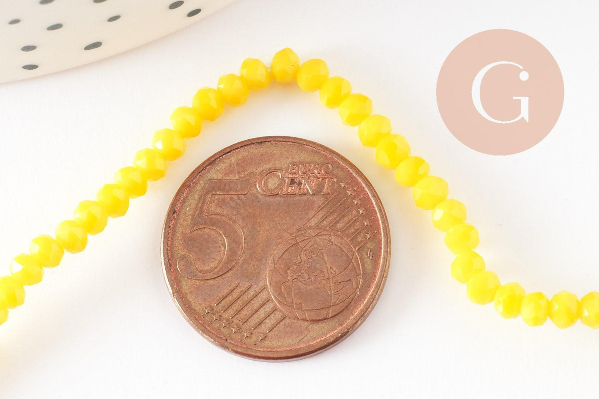 Perles rondelle verre jaune facette 3mm, x1 fil de 29cm (G2669)