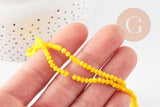 Perles rondelle verre jaune facette 3mm, x1 fil de 29cm (G2669)