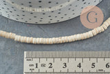 Perles rondelles howlite de synthèse blanche, x1 fil de 39cm (G0827)