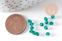Perles toupie bicone cristal autrichien facette vert 4mm, x20 (G10514)