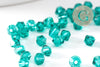 Perles toupie bicone cristal autrichien facette vert 4mm, x20 (G10514)