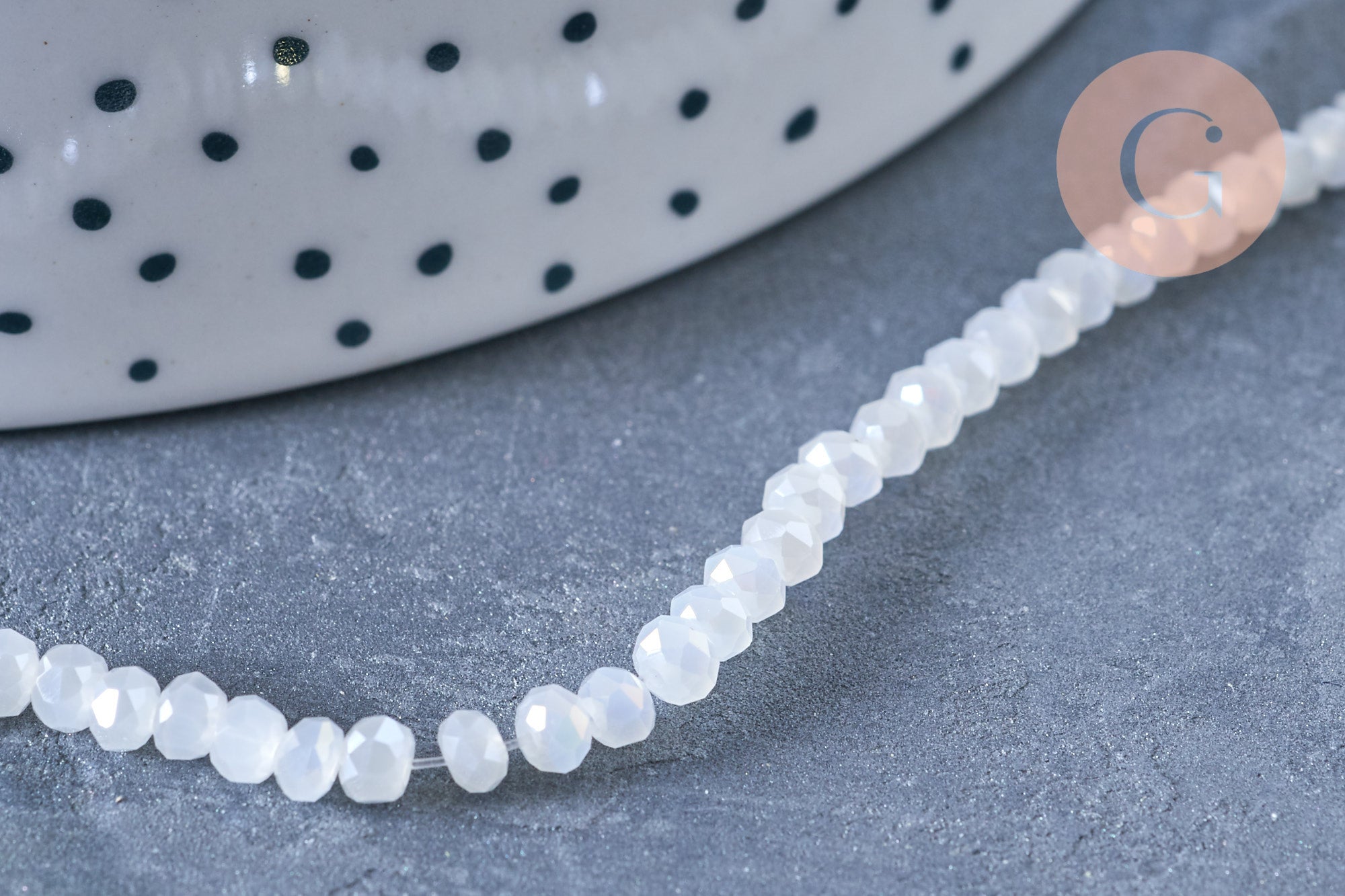 Perles toupies cristal blanc irisé 3.5x2.5mm, fil 25.4cm x1 (G6763)