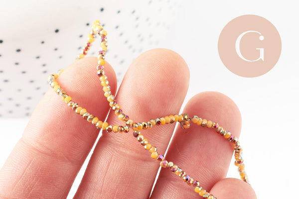 Perles toupies cristal jaune irisé, perles bijoux, perle cristal, Perle verre facette,fil de 26cm, 2mm, x1 (G4506)
