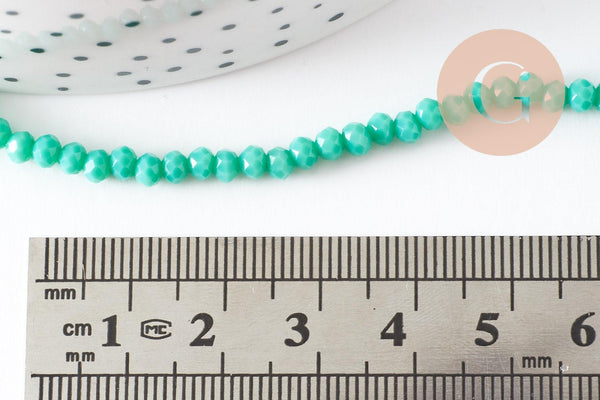 Perles toupies vert émeraude, perles bijoux, cristal vert, verre facette, fil de 42cm, 3mm, x1 (G3908)