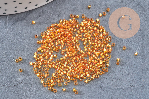 Perles tube verre orange transparent silver line façon Delica miyuki, x1 sachet de 8g (G10923)