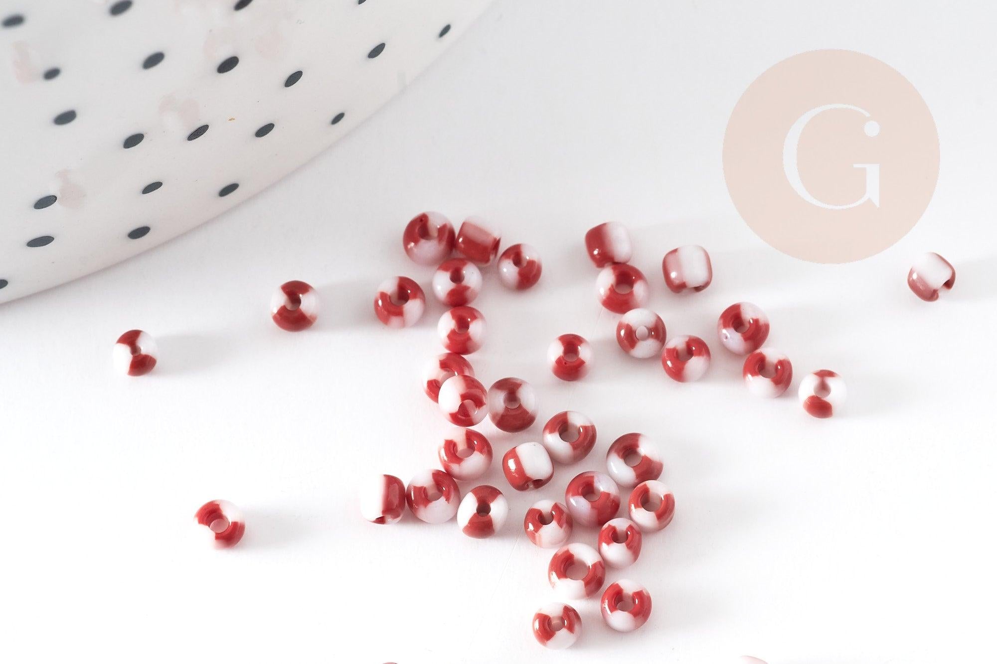 Petite perle rocaille rayé rouge blanc 1.5x2mm, x10g (G2670)