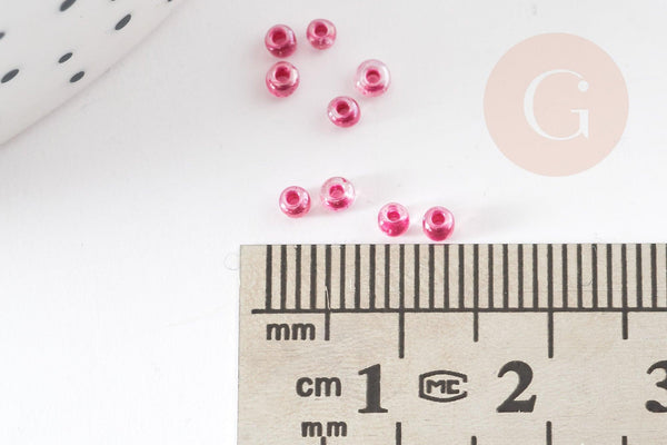 Petite perles de rocaille rose transparent 2.5mm, x 10gr (G2371)