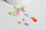 perle ronde Lettre Alphabet plastique multicolore, x10 grammes (G8826)