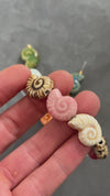 Multicolored porcelain snail shell beads 20.5mm, x1 strand of 35cm (G10325)